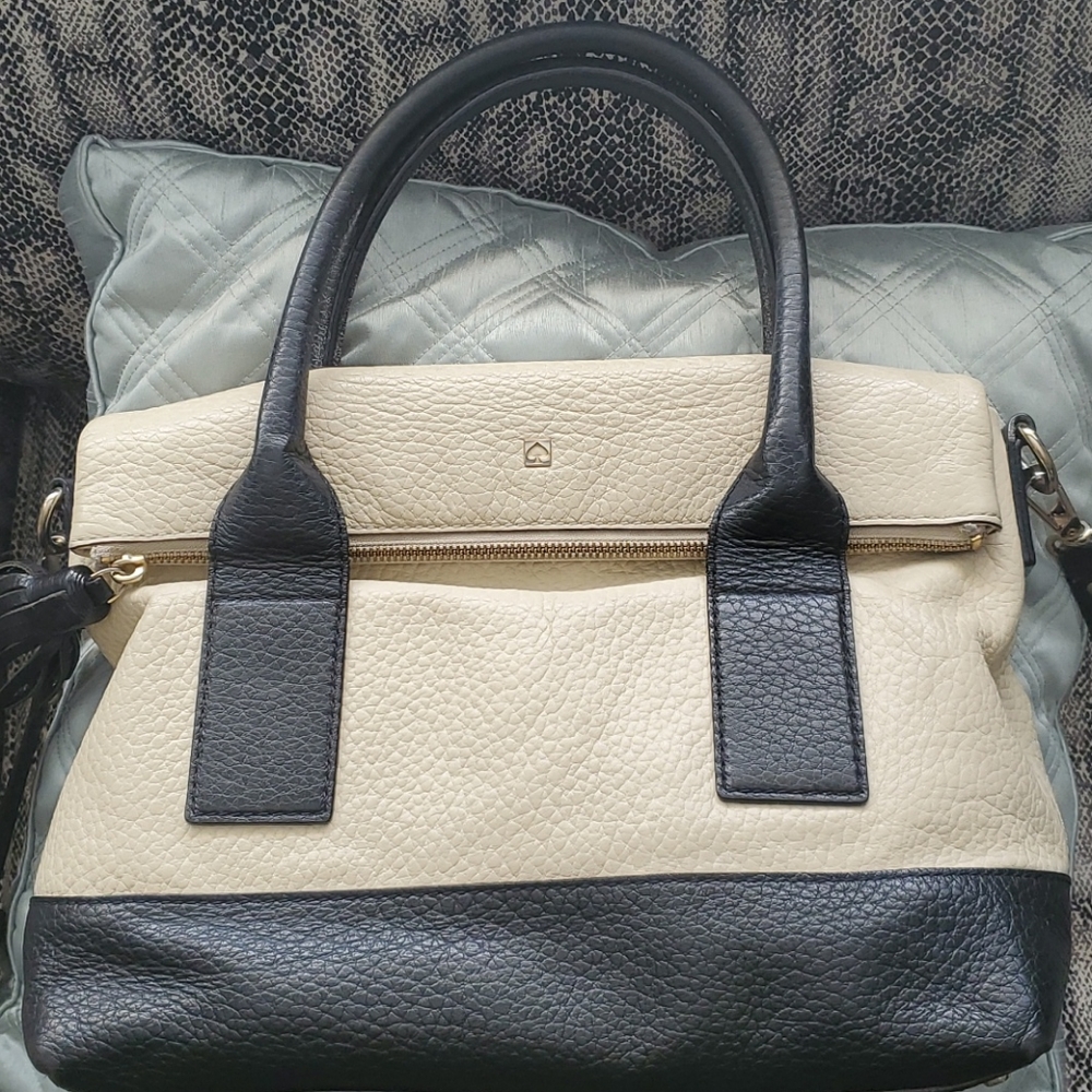 Kate Spade black and buttermilk pebbled leather.